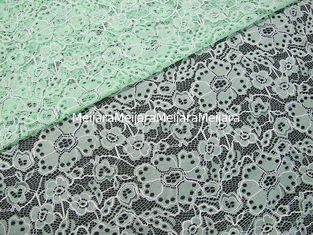 China Kundenspezifisches dauerhaftes Baumwollnylon gesticktes Spitze-Gewebe-Grün-Blumen-Muster fournisseur