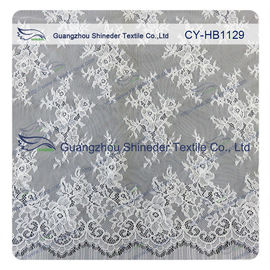 100% Nylon-Elfenbein ausgebogtes umrandetes Chantilly-Spitze-Hochzeits-Blumenkleid besonders angefertigt fournisseur